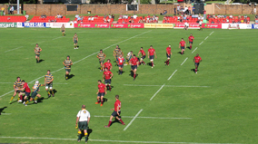 Rugby union game being played on the sports field.